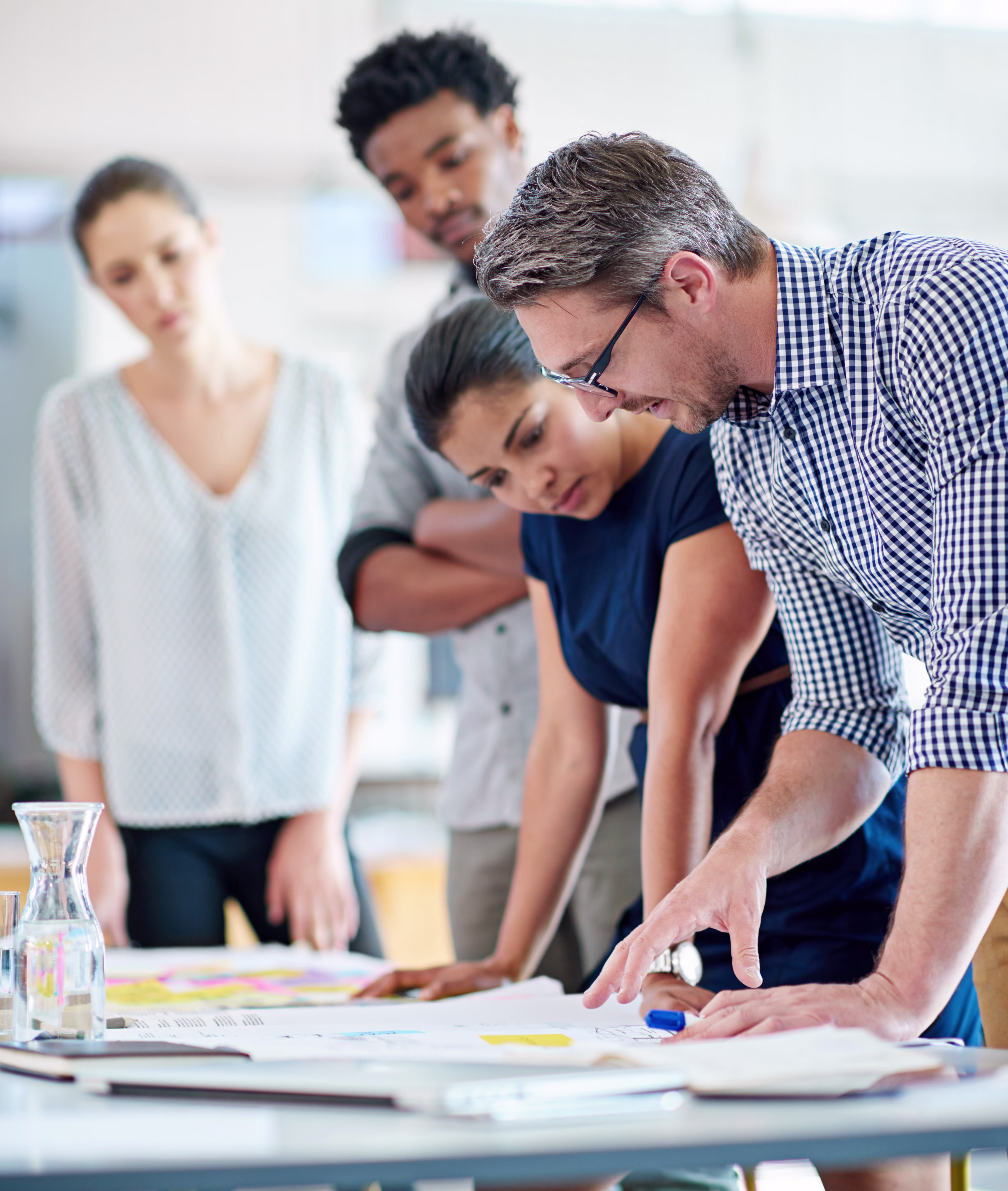 male-and-female-managers-planning-at-a-table-with-2025-04-05-18-41-33-utc-e1744246132191